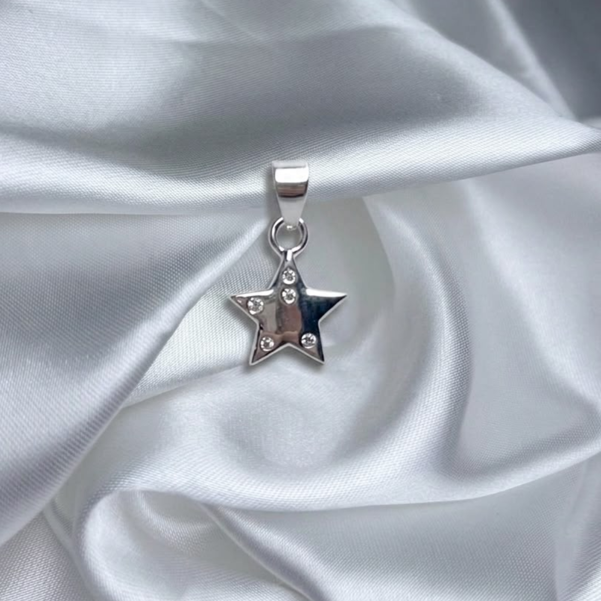 DIJE ESTRELLA PLATA CIRCONES TAILANDES