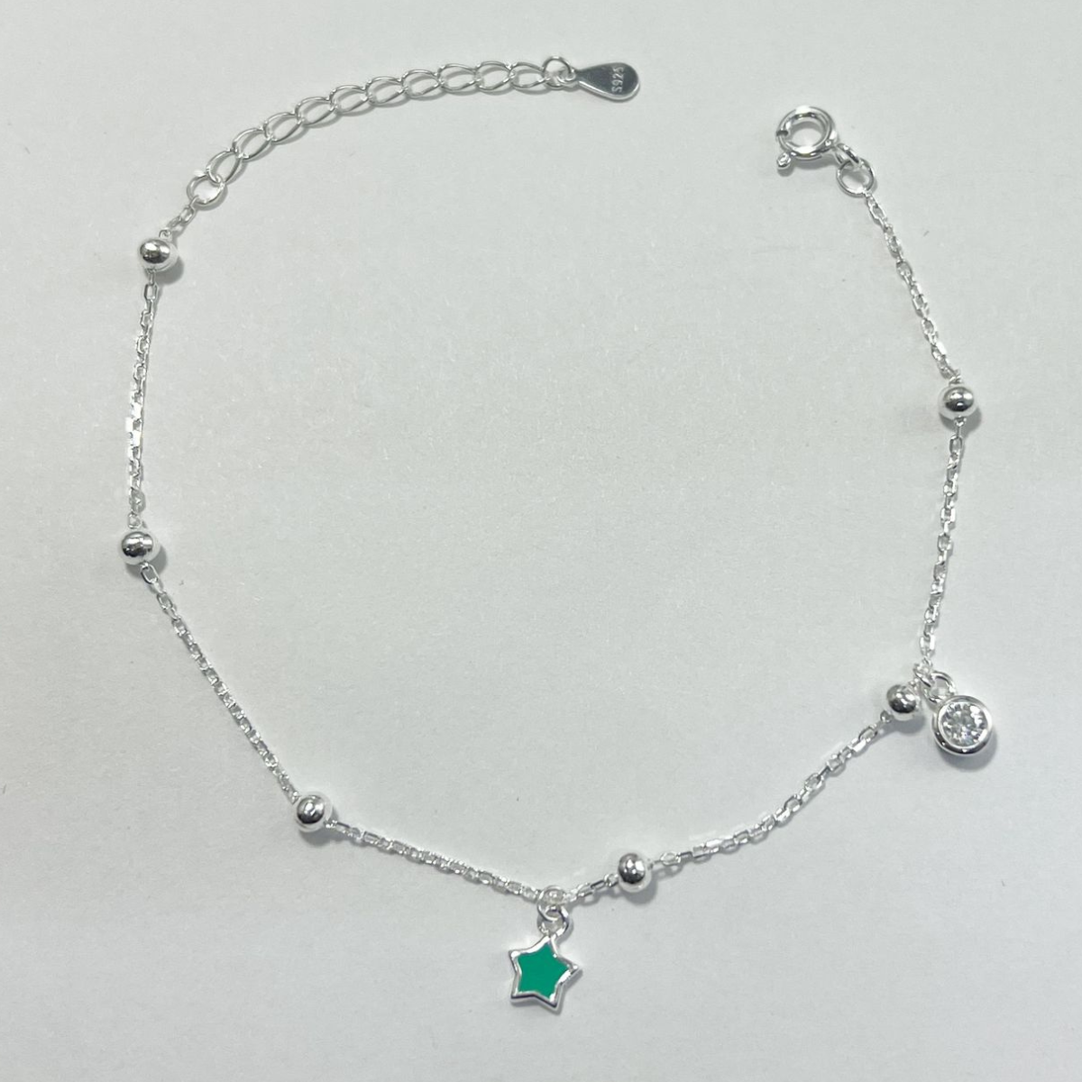 PULSERA CON ESTRELLAS Y BALINES EN PLATA LEY 925