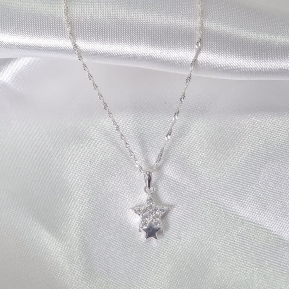 CADENA CON DIJE DE ESTRELLA EN PLATA LEY 925