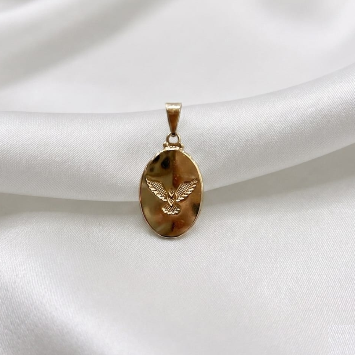MEDALLA OVALO ESPIRITU SANTO ORO LAMINADO 18K