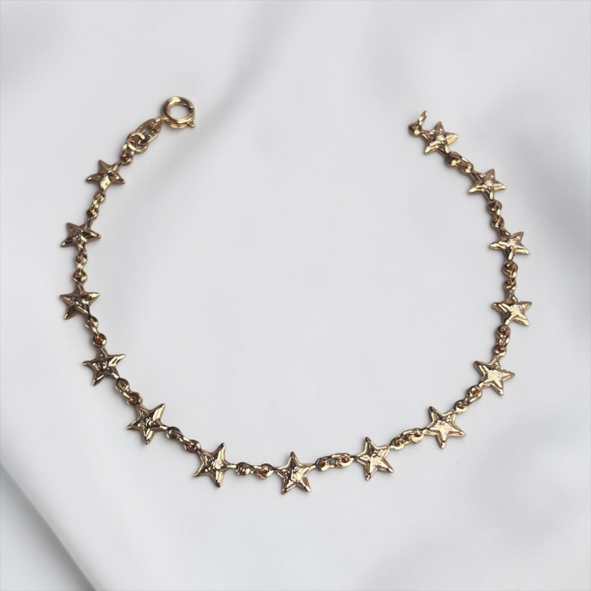 PULSERA ESTRELLAS ORO LAMINADO 18K