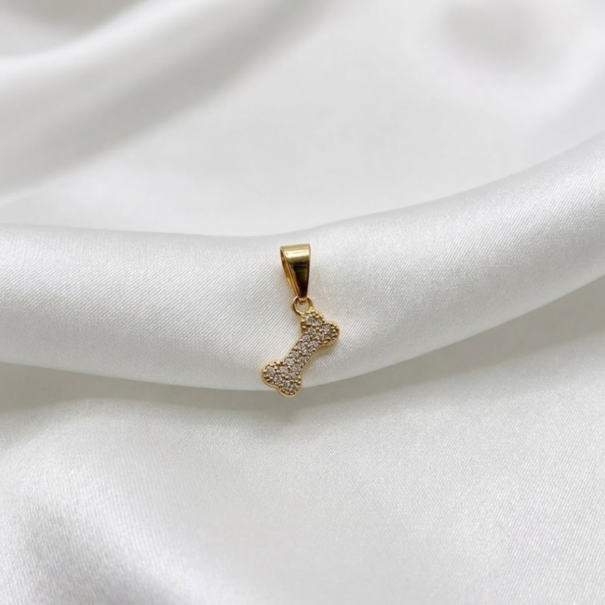 DIJE HUESO MICROCIRCON ORO LAMINADO 18K