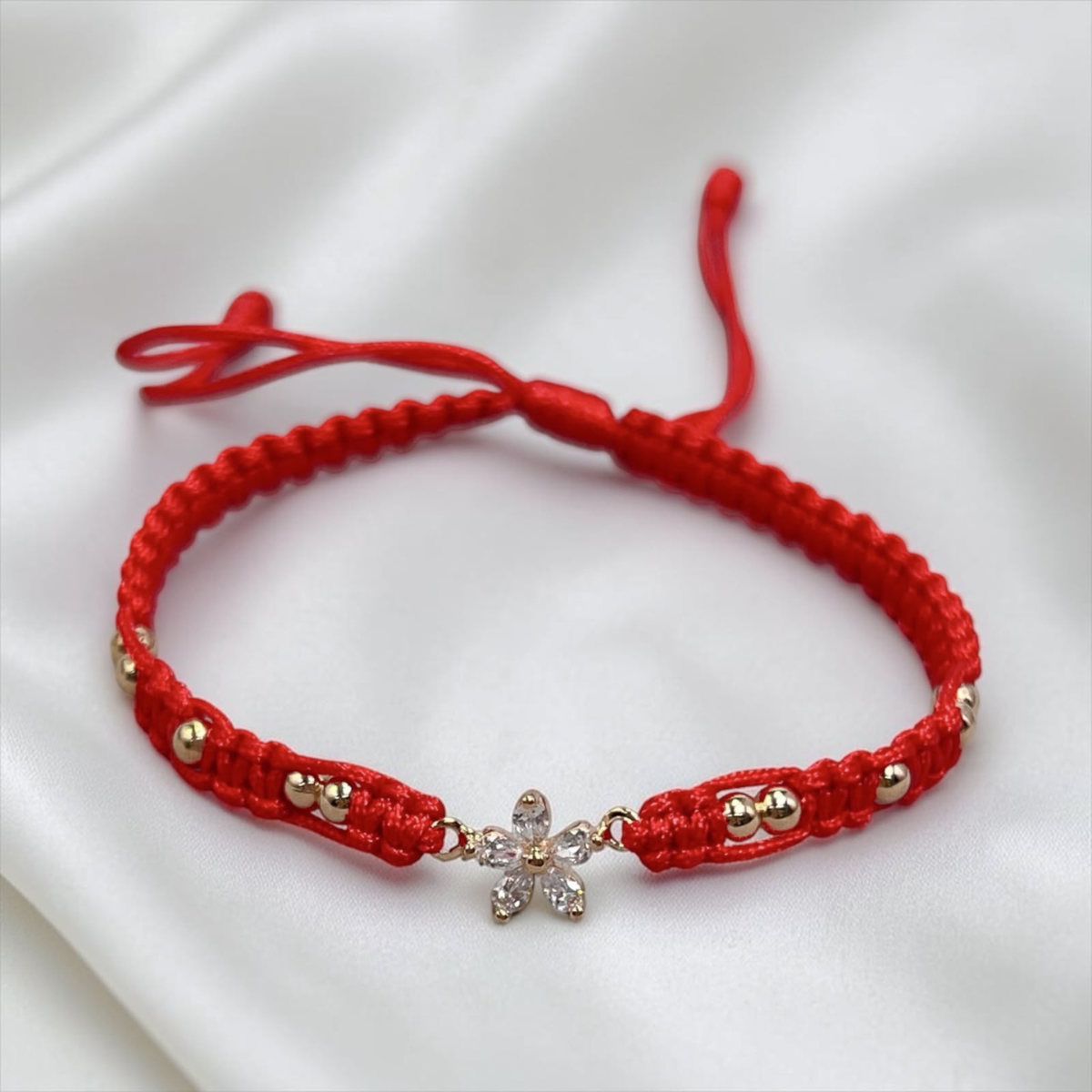 PULSERA ORO LAMINADO 18K FLOR TEJIDA