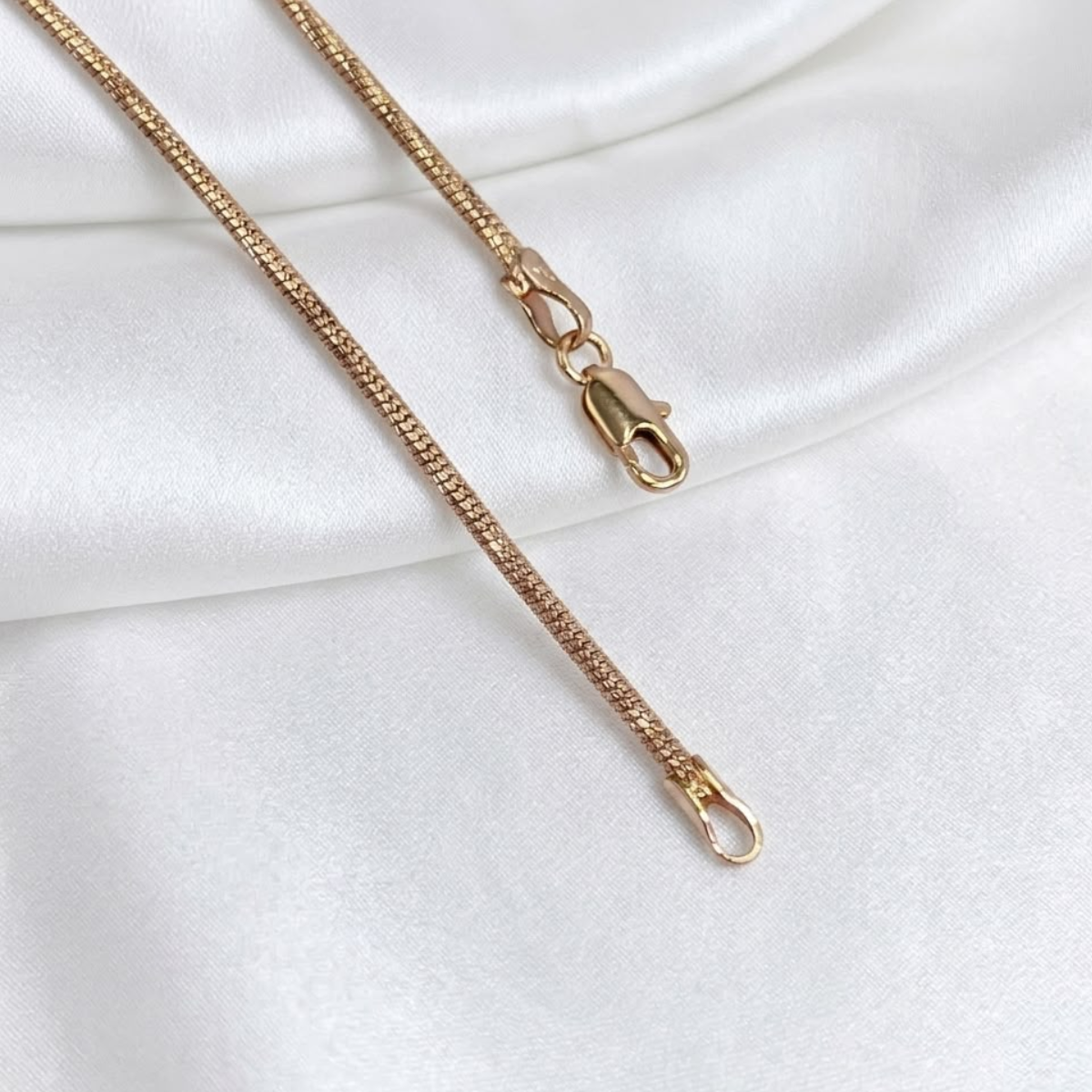 CADENA LAZO ORO LAMINADO 18K