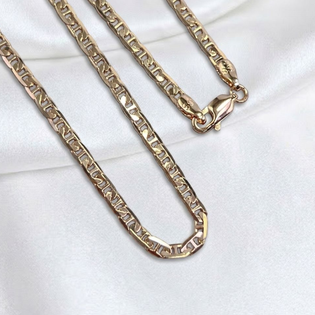 CADENA ESCALERA PLANA ORO LAMINADO 18K