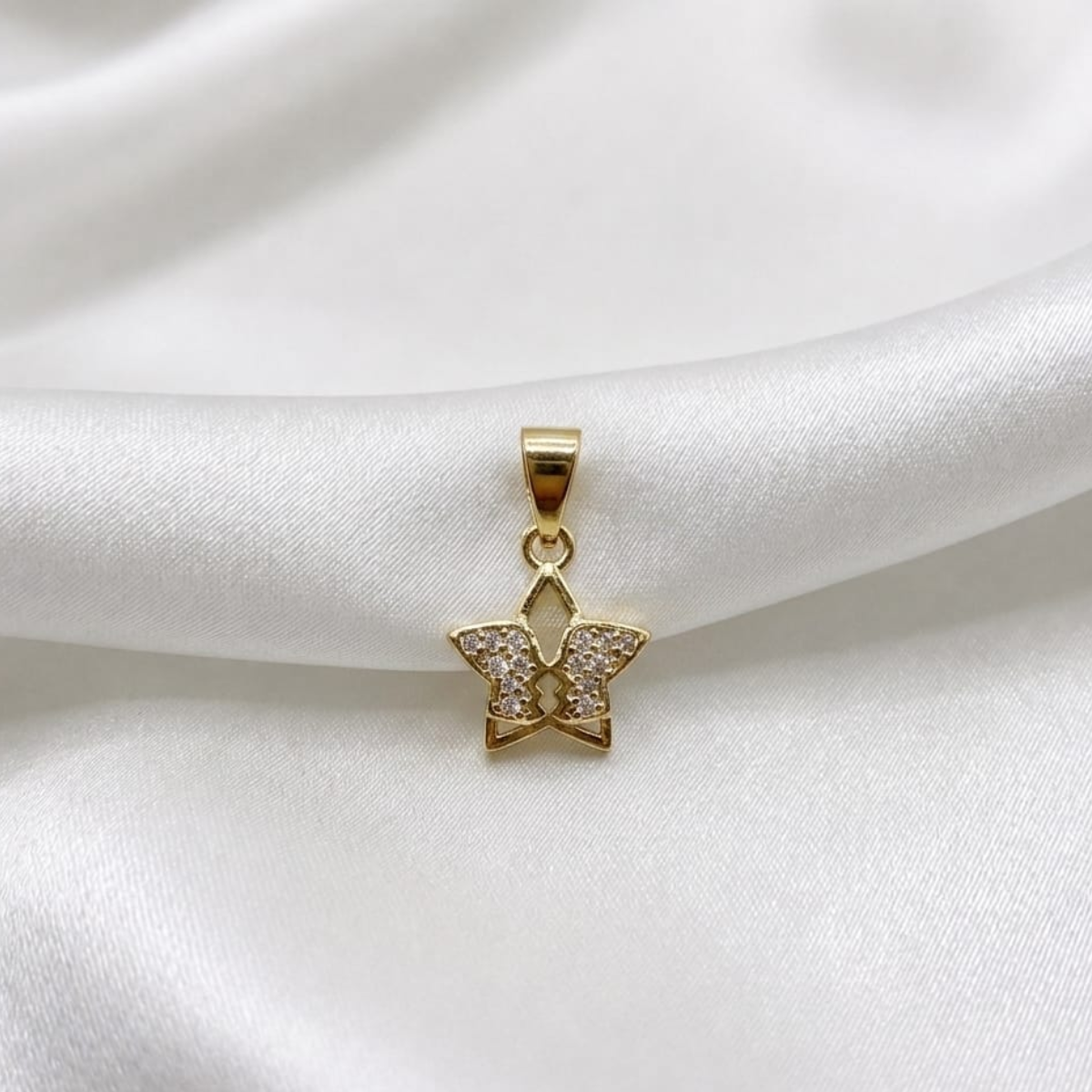 DIJE CIRCONES ESTRELLA ALAS ORO LAMINADO 18K