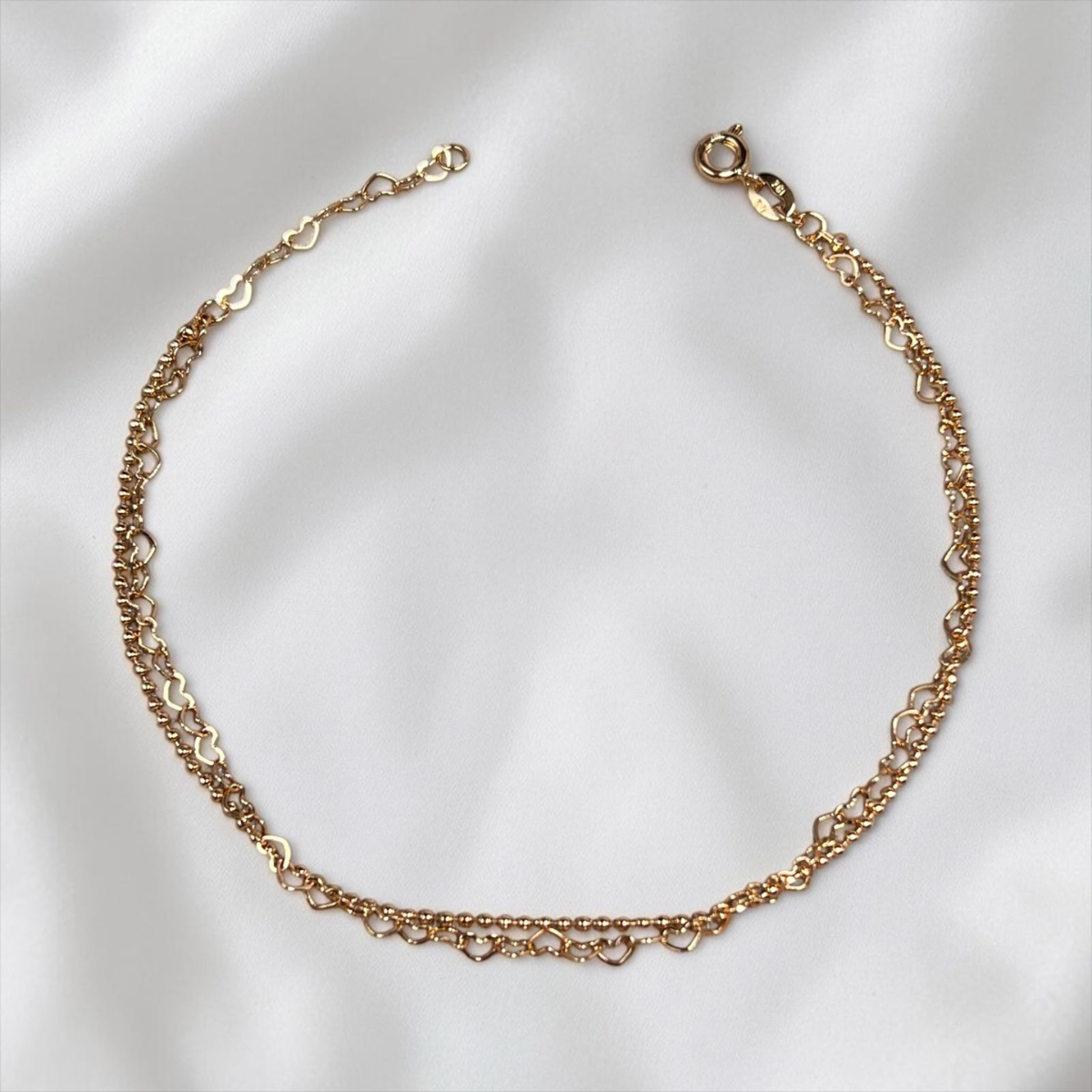 TOBILLERA CORAZONES ORO LAMINADO 18K