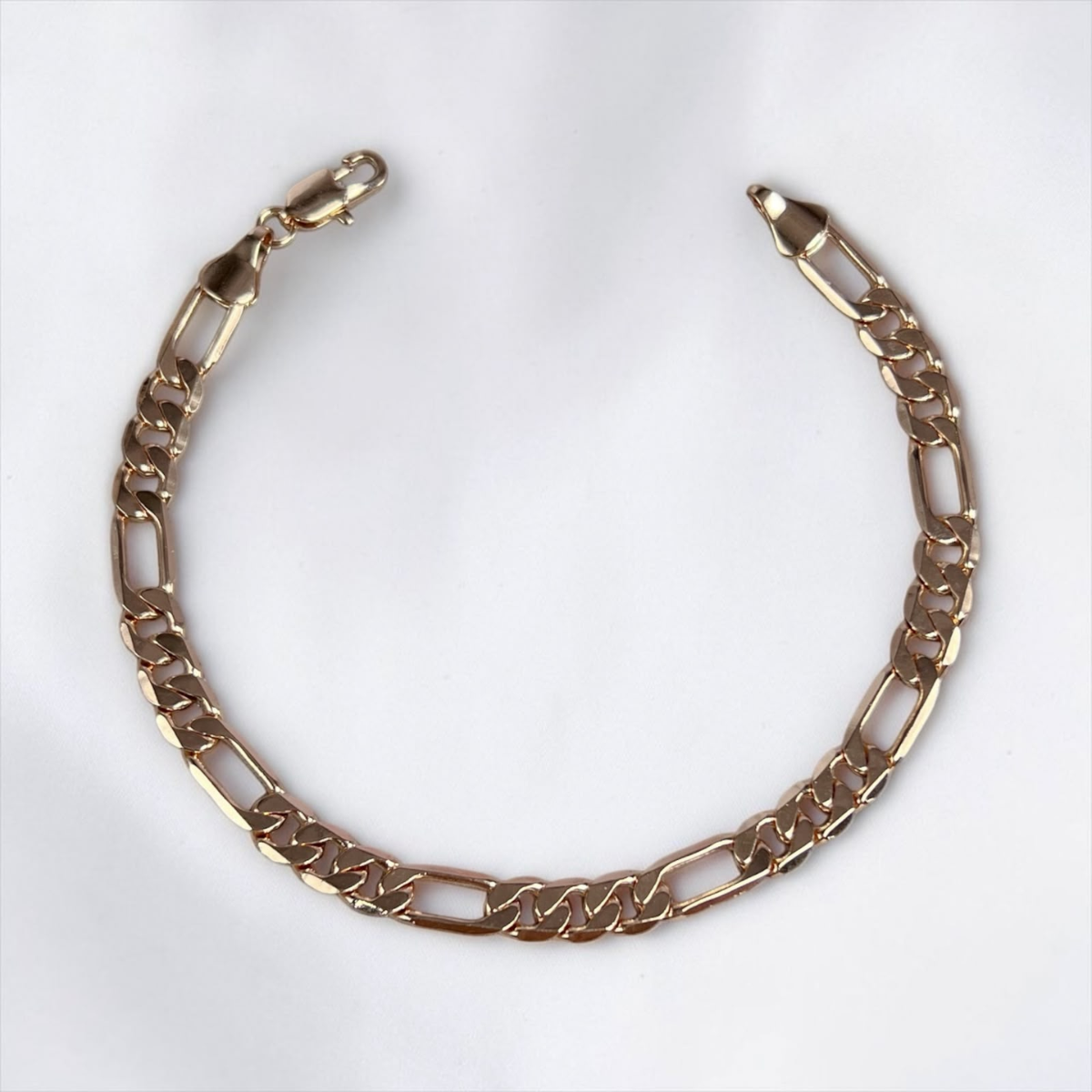 PULSERA TRES POR UNO ORO LAMINADO 18K