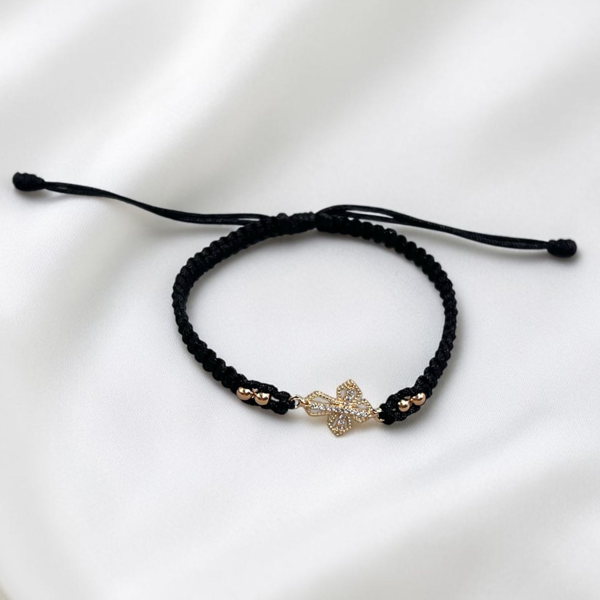 PULSERA ORO LAMINADO 18K CRUZ TEJIDA