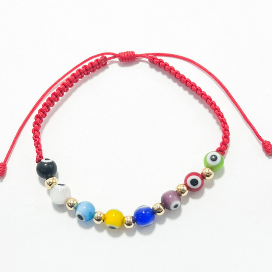 PULSERA TEJIDA ORO LAMINADO 18 K OJOS TURCOS