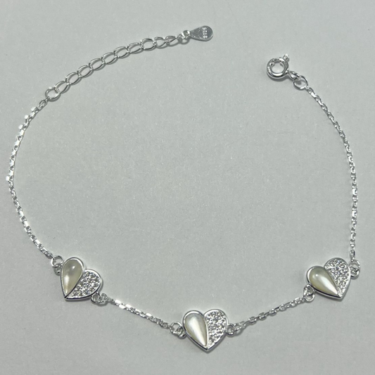 PULSERA DE CORAZONES CON MICRO CIRCONES EN PLATA LEY 925