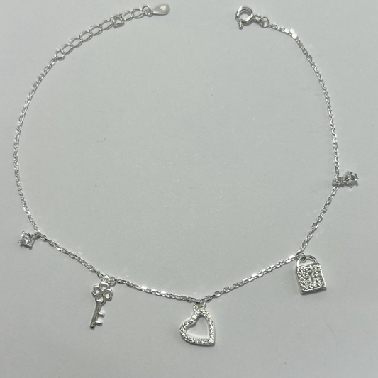 TOBILLERA EN PLATA CON DIJES EN MICRO CIRCONES