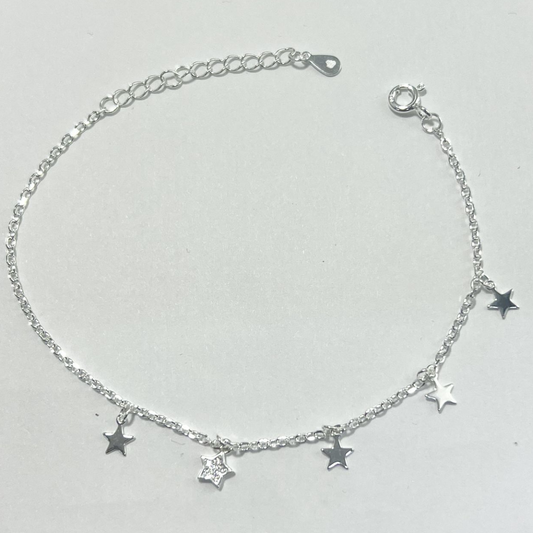 TOBILLERA CON DIJES DE ESTRELLA Y CIRCONES EN PLATA LEY 925