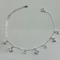 TOBILLERA EN PLATA CON DIJES DE CIRCONES