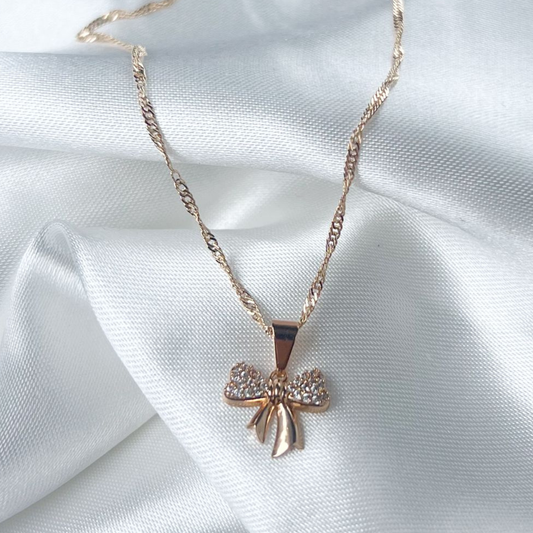 CADENA MAS DIJE MOÑO EN ORO LAMINADO 18K