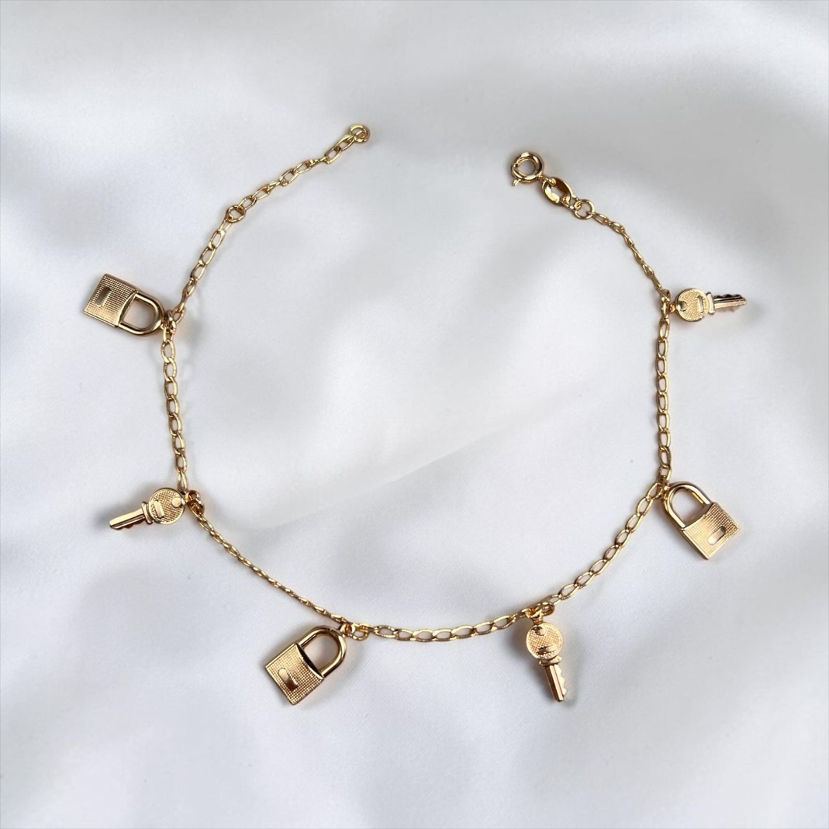TOBILLERA CANDADO Y LLAVE ORO LAMINADO 18K