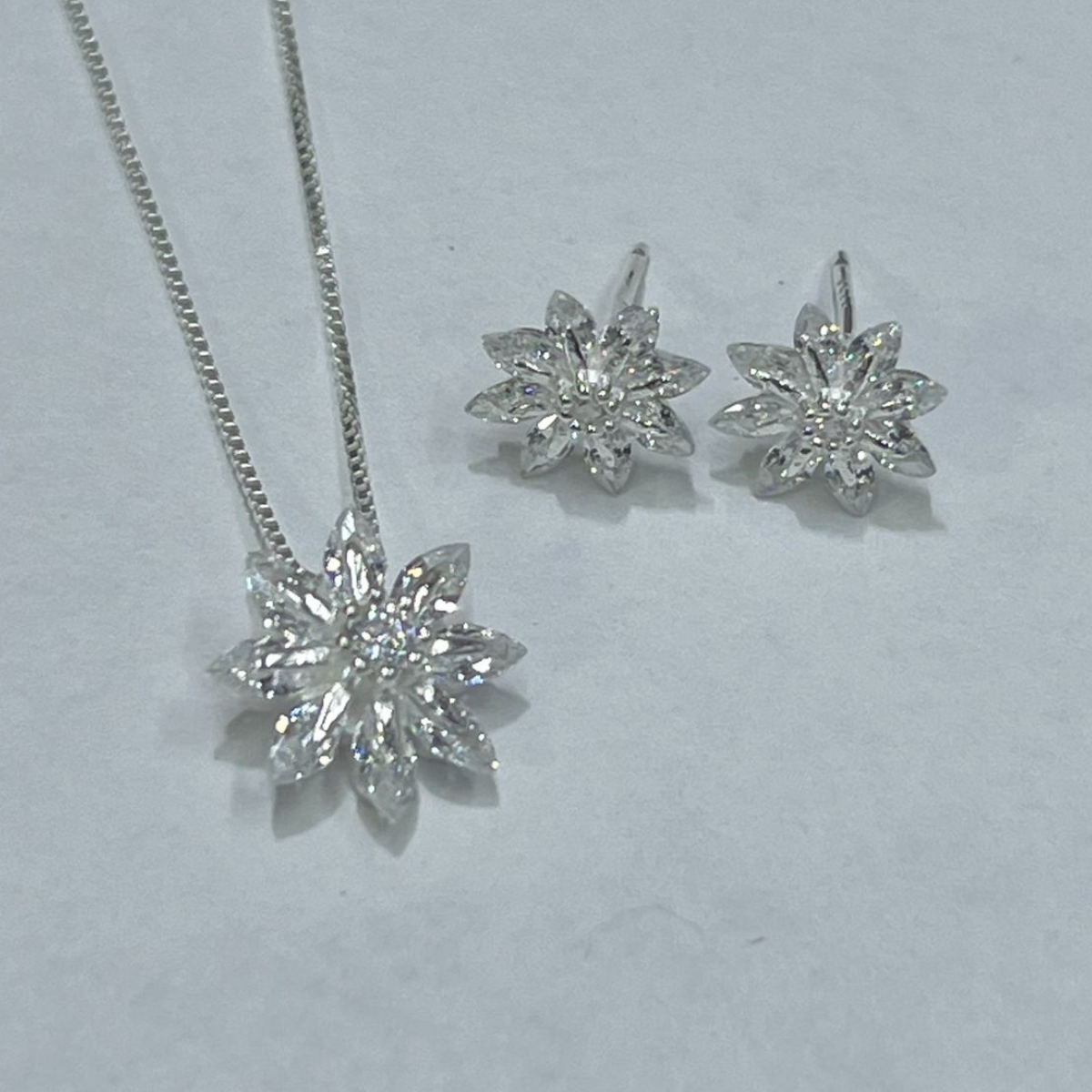 JUEGO DE PLATA FLOR OCHO PUNTAS