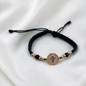 PULSERA ORO LAMINADO 18K CRUZ TEJIDA