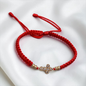 PULSERA ORO LAMINADO 18K CRUZ TEJIDA