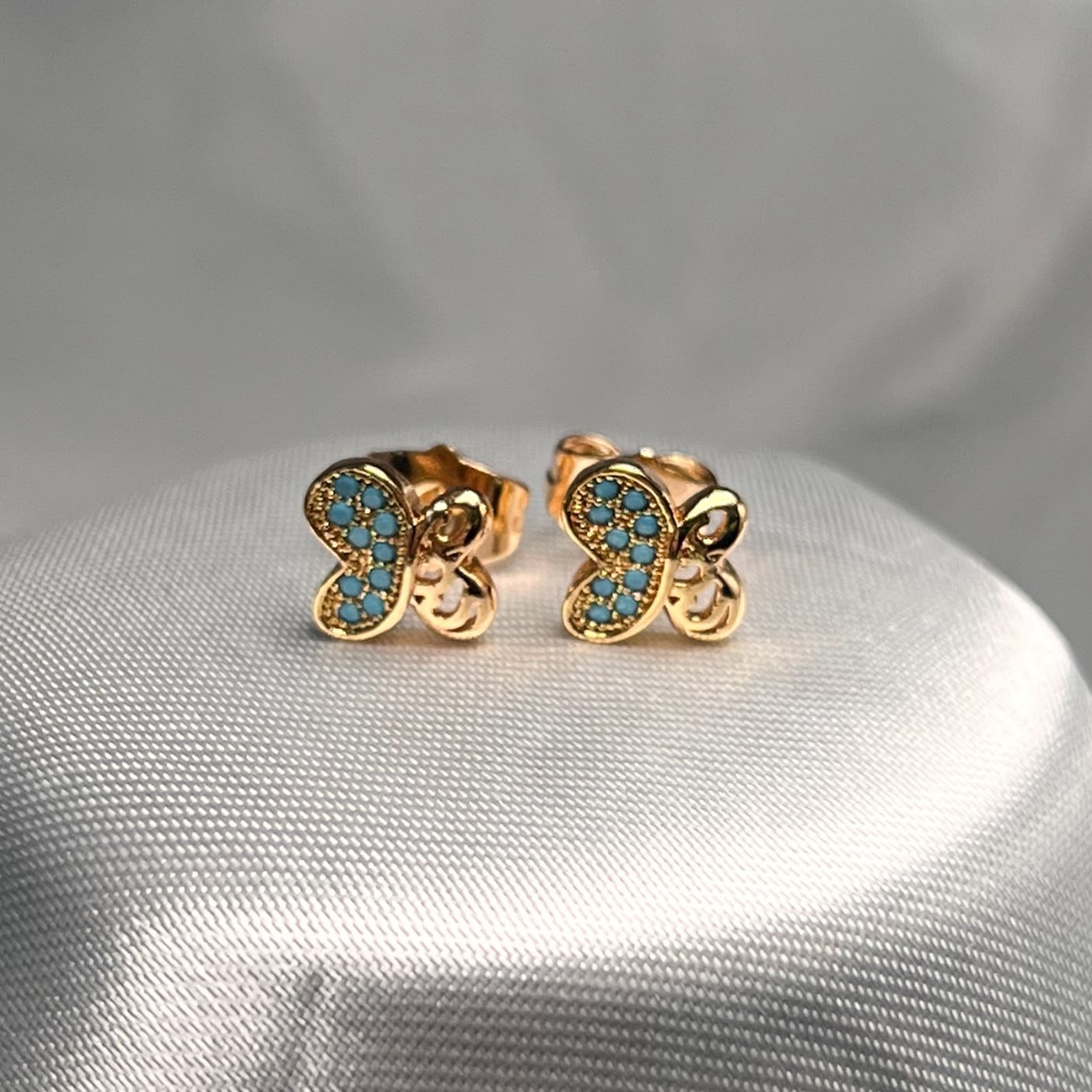 TOPO MARIPOSA MICROCIRCON AZUL CLARO